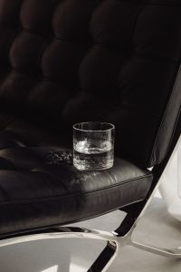 Kaboompics - Minimal Water Still Life on a Modern Lounge Chair