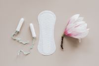 Kaboompics - Sanitary Pad with Tampons and Magnolia for a Menstrual Health Concept