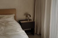 Kaboompics - Bedroom Styling with Black Nightstand and Dome Lamp beside Sheer Curtains