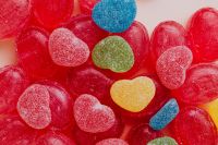 Kaboompics - Red, Pink, Green and Blue Jelly Candies in a Colorful Macro Flat Lay