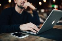 Kaboompics - Man, laptop, mobile phone