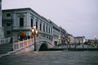 Kaboompics - Historic Bridge and Canal Boats Framed by Venice Palazzi