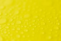 Kaboompics - Yellow Water Drop Background With Soft Focus Texture
