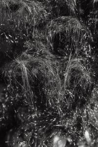 Kaboompics - Sparkling Silver Tinsel with Blurred Balloons Close-Up