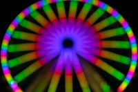 Kaboompics - Purple and Green Ferris Wheel Lights in Soft Focus