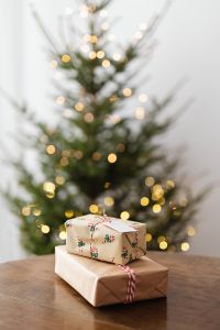Kaboompics - Christmas Tree and Wrapped Gifts with Warm Bokeh Lights