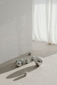 Kaboompics - New Year's Eve Party Background with Disco Balls and Sheer Curtains