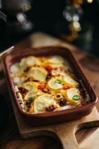 Kaboompics - Rustic Fish Casserole with Lemon and Pepper Close-Up
