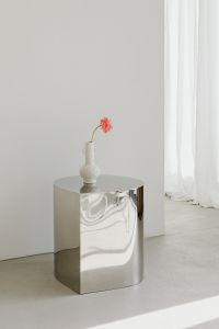 Kaboompics - White Vase and Chrome Pedestal in Strong Sunlight