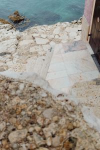Kaboompics - Rovinj Seaside Terrace Entrance with Marble Floor and Rocky Shore
