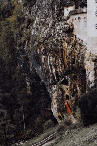 Kaboompics - Predjama castle at the cave mouth in Postojna, Slovenia