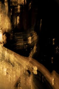 Kaboompics - Dark Gold Light Painting with Curved Brown Bands and Black Negative Space