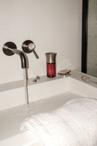Kaboompics - Clean Aesthetics: Serene Bathroom Ambiance with Luxury Skincare Products
