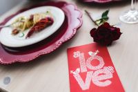 Kaboompics - Close-Up Red Love Card and Rose on Dinner Table