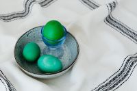 Kaboompics - Overhead View of Green Easter Eggs in a Ceramic Bowl