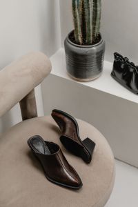 Kaboompics - Brown Leather Shoes Beside Cactus and Black Handbag