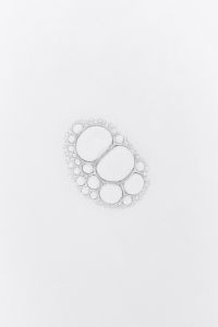 Kaboompics - Small White Foam Bubble Clusters on a Clean Background, Minimal Vertical Texture