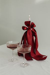 Kaboompics - Heart Cake, Red Bow Candle and Crystal Cocktail Glasses