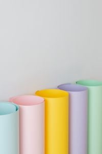 Kaboompics - Pastel Paper Rolls with Generous White Copy Space
