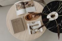 Kaboompics - Overhead Interior Styling with Kinfolk Book, Travertine Table and Pampas Vase