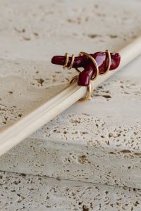 Kaboompics - Red Beaded Earrings on a White Rod