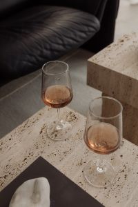 Kaboompics - Close-Up Travertine Table Edge and Neutral Rug