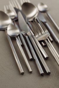 Kaboompics - Soft Focus Close-Up of Matte Steel Forks, Spoons and Knives