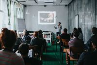 Kaboompics - People watching a presentation in a room