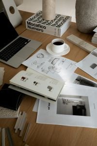 Kaboompics - Interior Design Moodboard with Coffee, Laptop, Material Samples and Sketches
