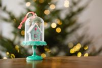 Kaboompics - Glass House Ornament on a Wooden Table