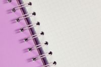 Kaboompics - Pink Spiral Notebook and White Graph Paper