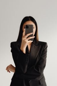 Kaboompics - Close-Up Mirror Selfie of a Woman in a Black Blazer