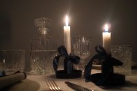Kaboompics - Two White Candles with Teal Satin Bows