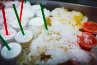 Kaboompics - Fresh Smoothie Cups Chilled in Ice at La Boqueria