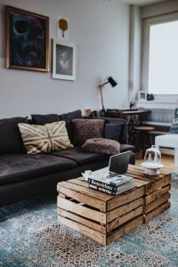 Kaboompics - Designer living room interior with a wooden box table and a light blue carpet