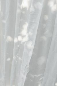 Kaboompics - Soft Folded White Linen Curtain in Natural Light