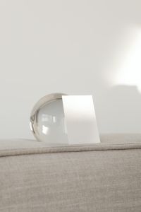 Kaboompics - Vertical Blank Card and Clear Glass Orb with Copy Space