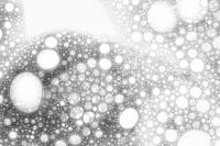Kaboompics - White Cosmetic Bubble Texture with Dark Foam Clusters and Open White Space
