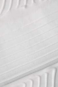 Kaboompics - Soft White Cream Streaks Crossing a Pale Background, Subtle Skincare Texture