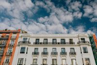Kaboompics - Madrid Historic White Facade and City Rooftops Beneath Dramatic Clouds