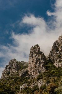 Kaboompics - Rocky Amalfi Coast Peak beneath Blue Sky and White Clouds
