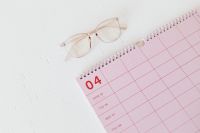 Kaboompics - Top View of Pink Calendar and Glasses with White Copy Space for Planner Mockups