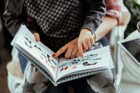 Kaboompics - Child reading a book