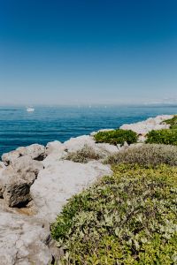 View from the rocky coast at the Adriatic Sea in the town of Izola, Slovenia