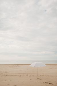 Kaboompics - White Beach Umbrella Under an Overcast Sky