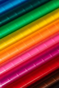Kaboompics - Diagonal Blurred Rainbow Crayon Strokes in Blue, Green and Warm Colors for Creative Design
