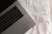 Kaboompics - Minimal Laptop Flat Lay with White Sheets and Copy Space