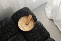 Kaboompics - Palo Santo in a Mother-of-Pearl Bowl on a Black Textured Armchair
