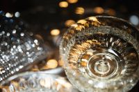 Kaboompics - Close-Up Champagne Coupe and Disco Ball with Golden Bokeh