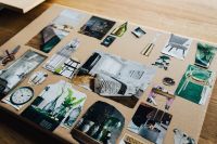Kaboompics - Designers working with material samples and paper cutouts